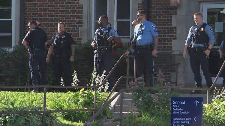 Emergency response teams at Annunciation Church in south Minneapolis following a mass shooting