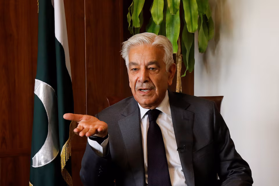 Pakistan's Defence Minister Khawaja Muhammad Asif speaks during an interview.