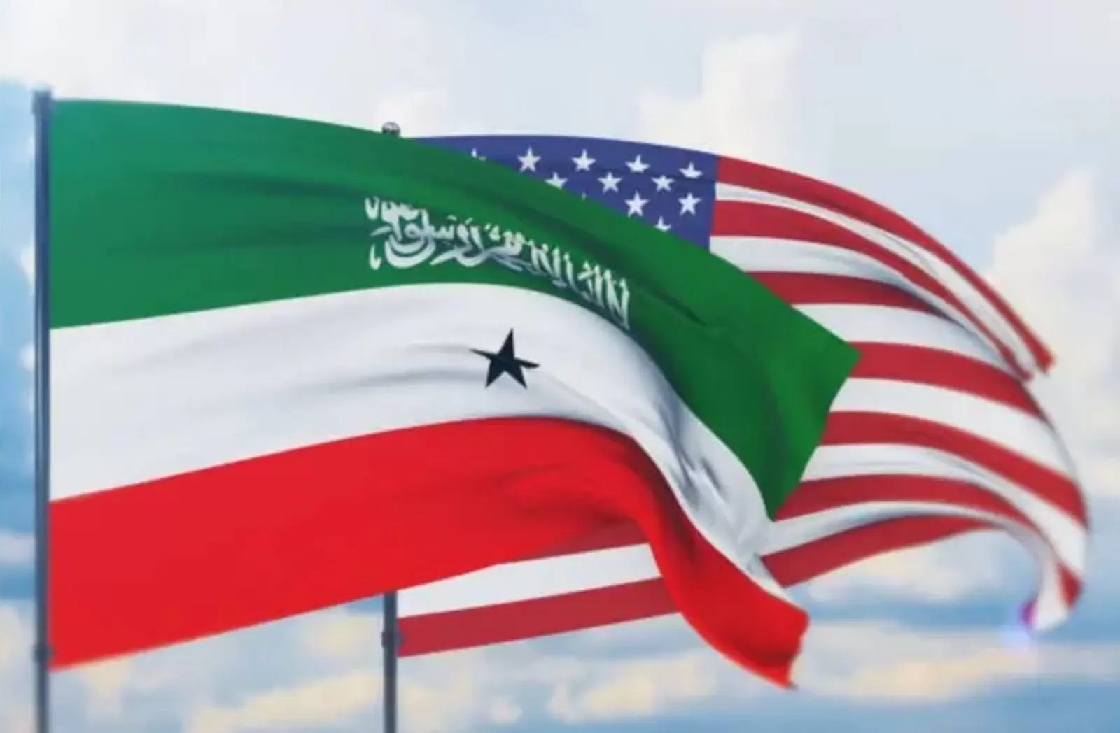 The national flags of Somaliland and the United States fly side by side.