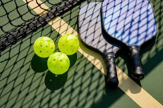 Pickleball paddles and balls