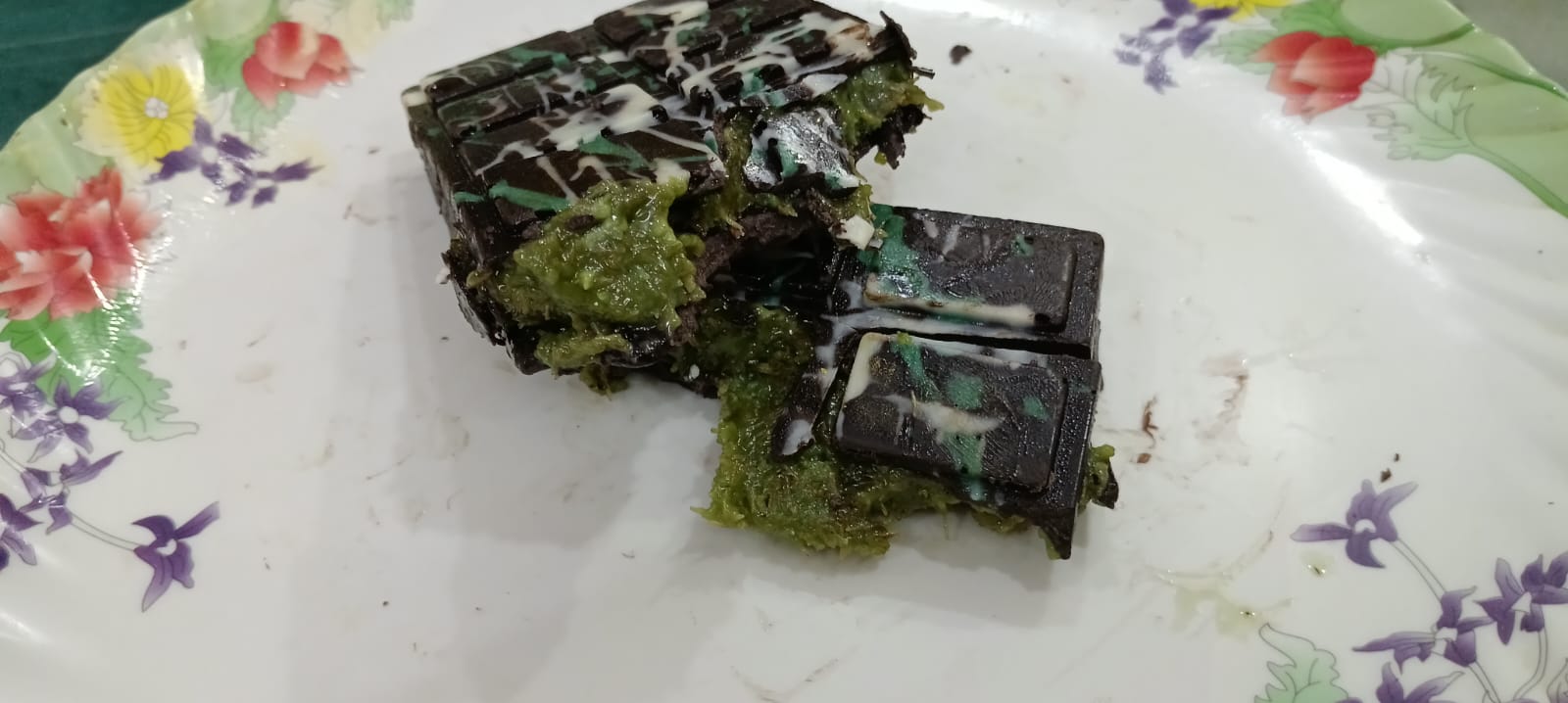 A chocolate infused or filled with kunafa, a traditional Middle Eastern dessert made of thin noodle-like pastry.